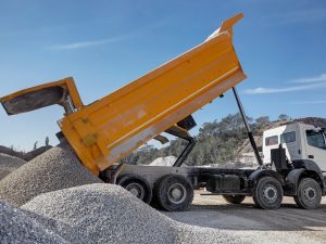 Dump Truck Hauling Gets Rid of Construction Concrete